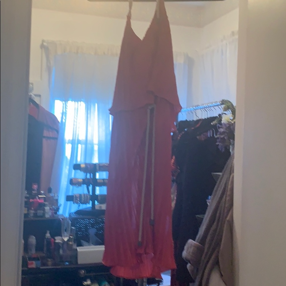 coral pleated cocktail dress.